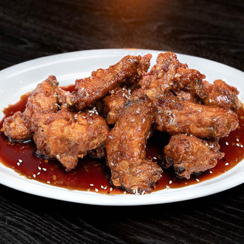 Jerk chicken served with rice at Mystic Caribbean Brampton